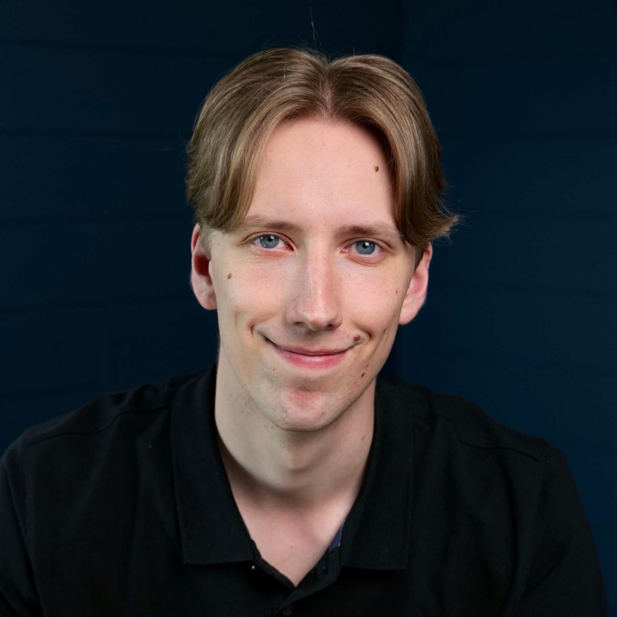 A professional headshot of Josh Flood.