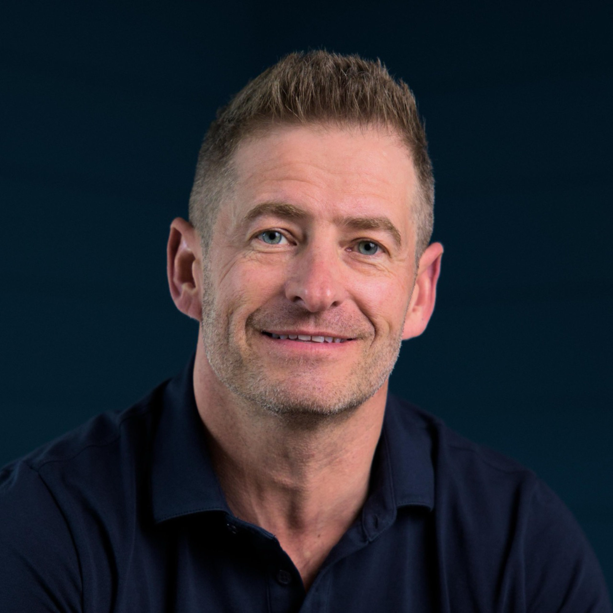 A professional headshot of Shea Sanche.