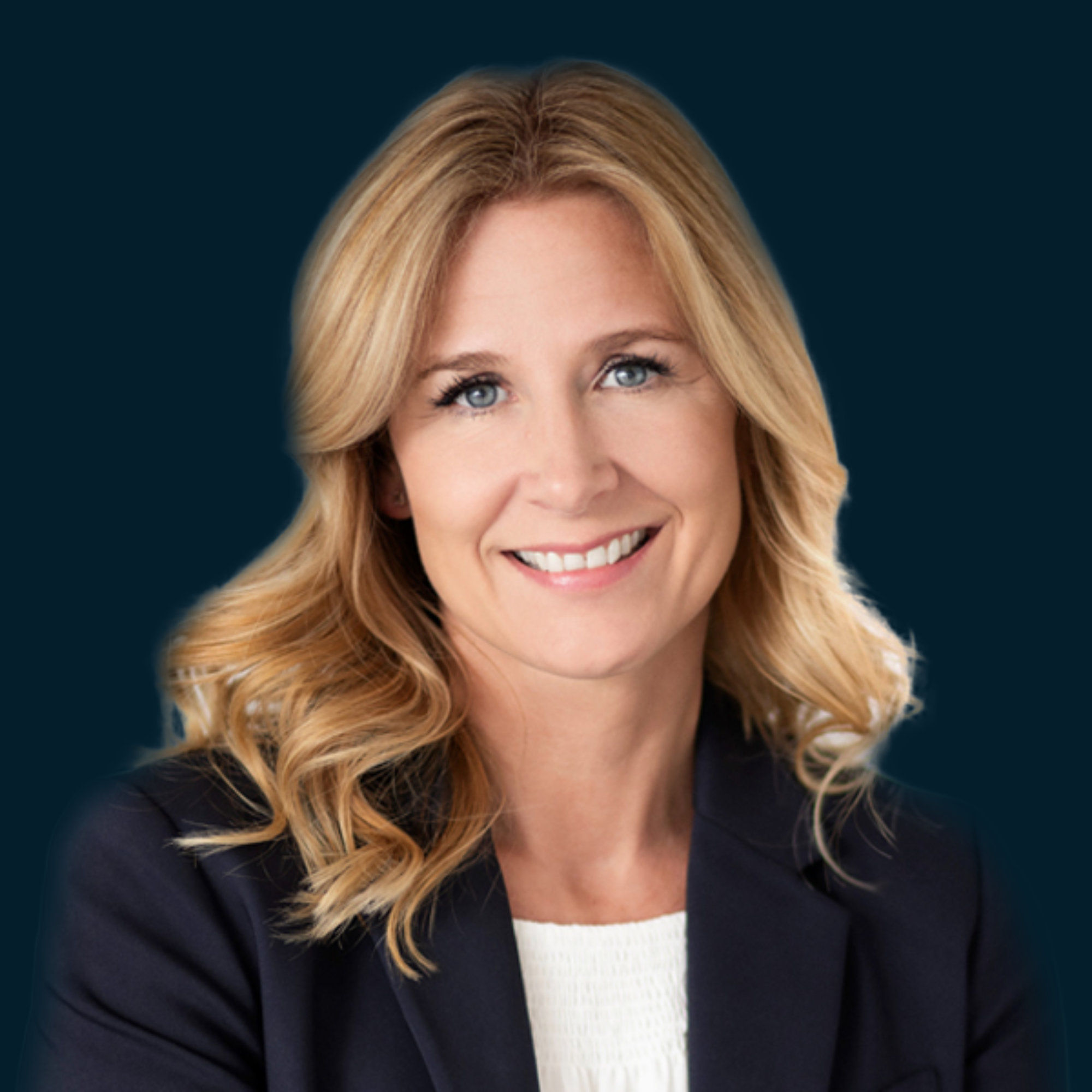 A professional headshot of Trish.